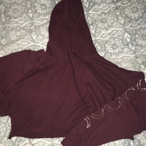 Cropped hoodie with moon and sun on sleeve